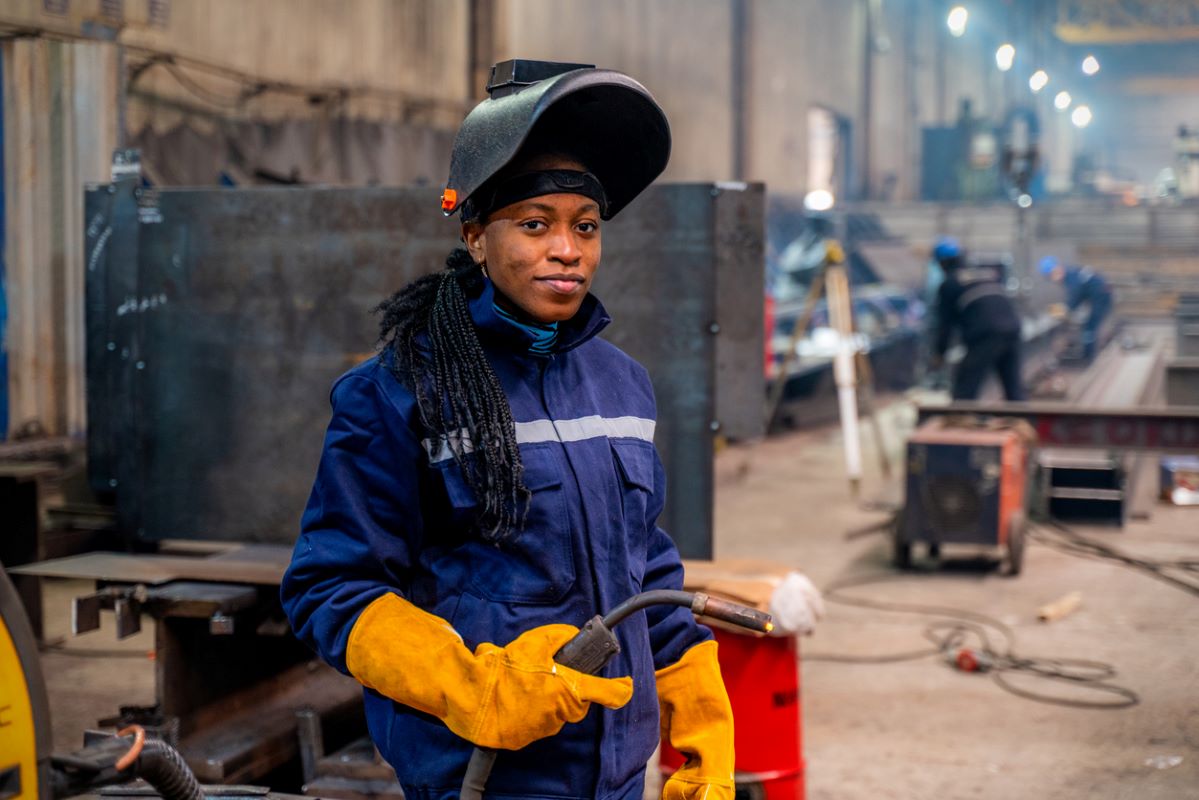 Factory woman welding industrial istock phynart studio 1461587484