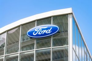 AN OFFICE BUILDING BEARS THE FORD MOTOR COMPANY LOGO