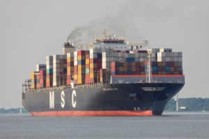 A LARGE CONTAINER SHIP AT SEA BEARS THE LETTERS MSC