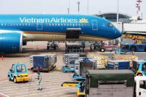 A VIETNAM AIR JET SITS ON A RUNWAY