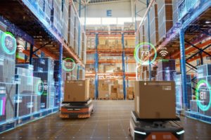 AUTONOMOUS MOBILE ROBOTS AT WORK IN A WAREHOUSE 